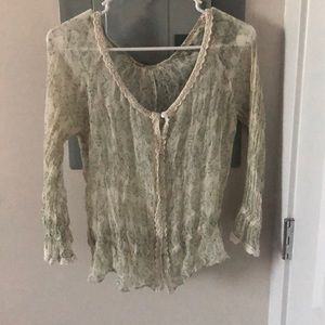 Lacey, ruched light green top.